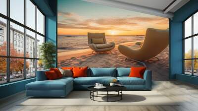 Lounge chairs on the beach with sunset view Wall mural