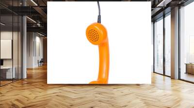 Orange handset on a white background Wall mural