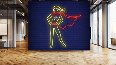 Confident superhero woman neon sign. Leadership, power, protector design. Night bright neon sign, colorful billboard, light banner. Vector illustration in neon style. Wall mural