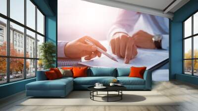 Business people negotiating a contract. Wall mural