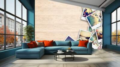 frame with old paper and photos on wooden background. Wall mural