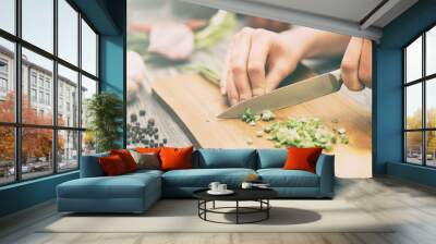 The chef slicing vegetables. Wall mural