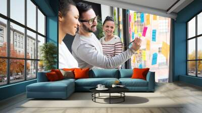 Young creative business people meeting at office. Wall mural