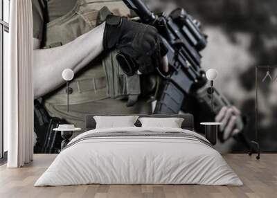 Armed Security contractor holding AR15 Rifle Wall mural