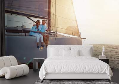 Holiday, relax and couple on a yacht in the ocean for adventure, freedom and sailing trip. Travel, summer and mature man and woman on a boat in the sea for a romantic seaside vacation in Greece. Wall mural