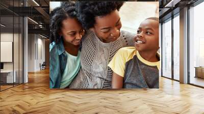 Love, mother and children embrace sofa for happy family time together to relax in apartment in South Africa. Smile trust and support, black woman and kids sitting on couch with healthy relationship. Wall mural