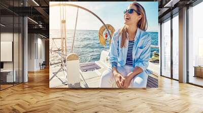 Travel, cruise and woman on yacht for holiday, summer vacation and weekend getaway in Italy. Travelling lifestyle, ocean adventure and happy lady with sunglasses smile, relax and enjoy boat trip Wall mural