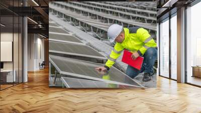 Engineer working at floating solar farm,checking and maintenance with solar batteries near solar panels,supervisor Check the system at the solar power station Wall mural