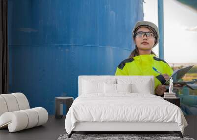 Environmental engineers work at wastewater treatment plants,Female plumber technician working at water supply Wall mural