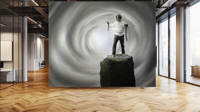 man standing and looking on broken chains with open heaven behind him - christian freedom concept Wall mural