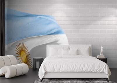 Argentina national flag cloth fabric waving on beautiful bricks Background.	
 Wall mural