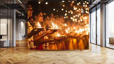 Indian Couple Holding Lit Diyas During a Ceremony Wall mural