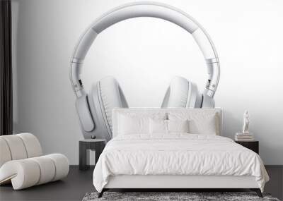 Pair of white headphones resting on a white background Wall mural