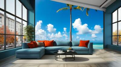 Palm tree on tropical beach with blue sky and white clouds abstract Wall mural