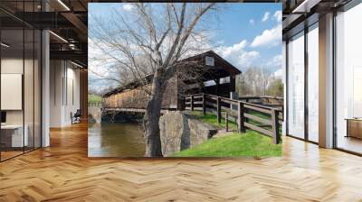 Perrine's Bridge is the second oldest covered bridge in the State of New York. This Burr Arch Truss Bridge crosses the Wallkill River in the Town of Esopus-Rosendale near Rifton, NY.  Wall mural