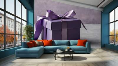 beautiful purple gift box on a pastel gray aesthetic background with space for text, concept for Birthday or Christmas or Valentines Day Wall mural