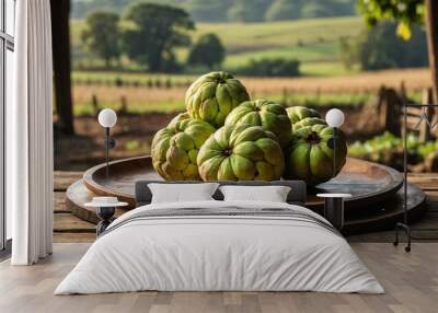 rustic wooden table with a wooden plate filled with fr background Wall mural