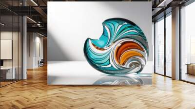 Colorful glass sculpture illuminated by natural light on a reflective surface Wall mural