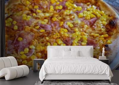 Pizza on a restaurant table Wall mural