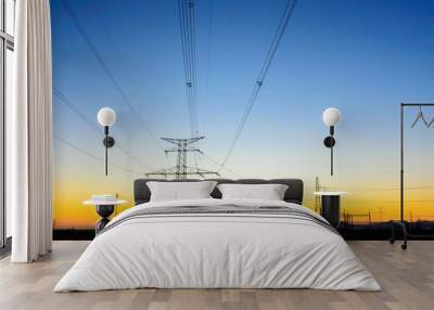 Electric powerlines over sunrise Wall mural