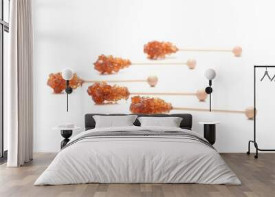 Brown sugar crystal on wooden stick Wall mural