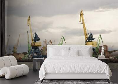 Heavy harbor jib cranes in the Klaipeda Sea Port, Lithuania. Wall mural