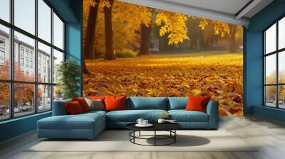 Golden autumn scene in a park with falling leaves Wall mural