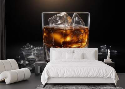 whiskey with ice cubes over a black background Wall mural