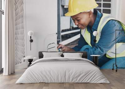 Happy black woman, technician and building installation for air control, construction or vent on roof. African female person, contractor or engineer installing industrial equipment for architecture Wall mural