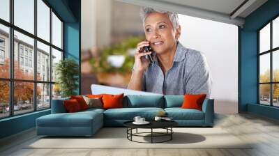 Phone call, laptop or senior manager networking, talking or speaking of our vision, goals or company mission. Communication, boss or mature business woman in conversation or discussion in office room Wall mural