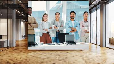 Smile, crossed arms and portrait of business people in the office in collaboration for team building. Happy, diversity and group of professional creative designers with confidence in modern workplace Wall mural