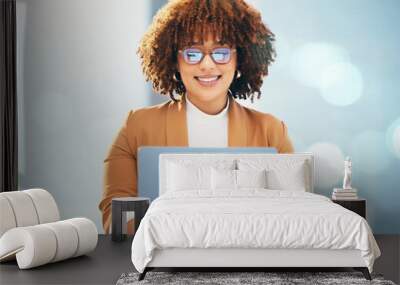 Business, black woman and laptop with glasses reading or typing email online in office. Entrepreneur person smile at desk with technology and bokeh mockup space for career research and data analysis Wall mural