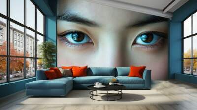 Close-up of a woman's brown eyes with long eyelashes Wall mural