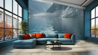 Two cups of coffee on a wooden table with a view of a fjord and mountains in the background. Wall mural