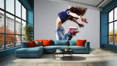 modern young beautiful dancer posing on a studio background Wall mural