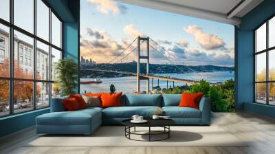 ISTANBUL, TURKEY. Panoramic view of Istanbul Bosphorus on sunset. Istanbul Bosphorus Bridge (15 July Martyrs Bridge. Turkish: 15 Temmuz Sehitler Koprusu). Beautiful cloudy blue sky. Wall mural