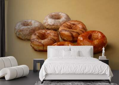 Tasty fresh doughnuts in studio  Wall mural