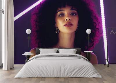 Neon light, fashion woman and beauty portrait in studio with purple uv for makeup, cosmetics and self love. Face of aesthetic gen z model black person on gray background for natural art glow on skin Wall mural