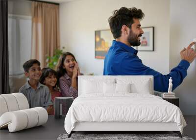 Professional Indian Technician Setting Up Smart Home Appliance as Family Watches in Anticipation Wall mural