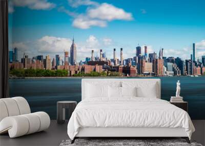 Manhattan New York City Skyline on a beautiful sunny and cloudy blue sky day Wall mural