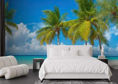 A view of a tropical beach with site palm and coconut. Wall mural