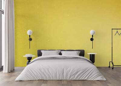 Bright yellow wall paper or shiny wrapping paper with a gold texture background can be used as a decorative element. Wall mural