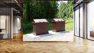 Two bear proof garbage containers in the forest at the the Summit Bechtel Reserve Wall mural