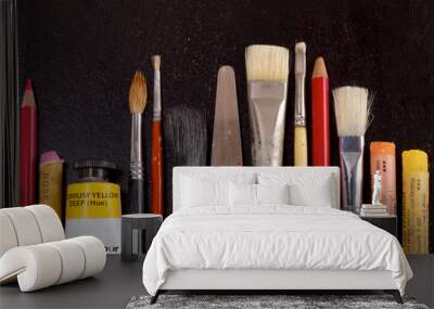 Diversity of art supplies in a row Wall mural