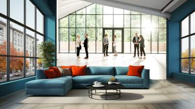 Business people at the spacious modern hall with big window overlooking on the park. Wide view with copy space Wall mural