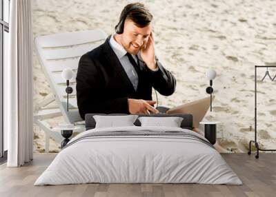 Businessman on the beach Wall mural