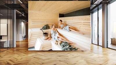 Girlfriends relaxing in the sauna Wall mural