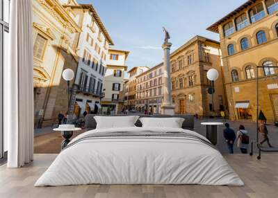 Morning view on Piazza Santa Trinita, triangular square, in Florence city. Travel italian cities of Tuscany. Italian Renaissance architecture Wall mural