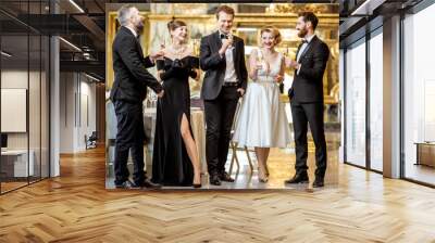 Well-dressed people celebrating New Year indoors Wall mural