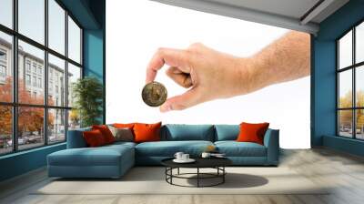 male hand holding bitcoin coin on isolated white background with space copy Wall mural